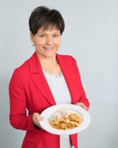 Claudia Horacek mit dem prämierten Roten Fischcurry mit Sesamreis von Gourmet Business À la Carte.